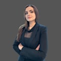 Karina Asvolinsque Esq.