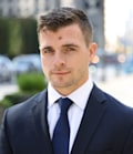 J. Ryan Behrmann