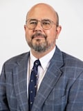 John B. Buda