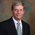 Charles E. Grisi Esq.