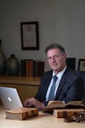 John E. Gutbezahl