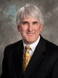 Mark E. Honhart