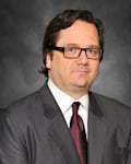 John D. Jones Esq.