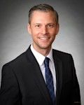 Corey J. Kuzma
