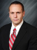 John G. Koufos