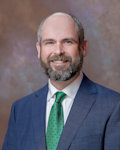Adam D. Land