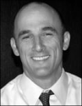Thomas E. Loeser