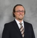Aidan C. McGlaze