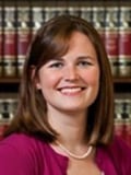 Ashley E. Miles