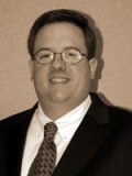 John T. Brost