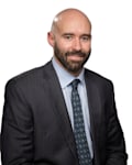 Justin K. Romig