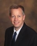 Scott E. Racop