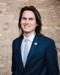 Andrew K Strong