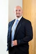 John E. Tsikerdanos