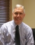 Daniel E Warner
